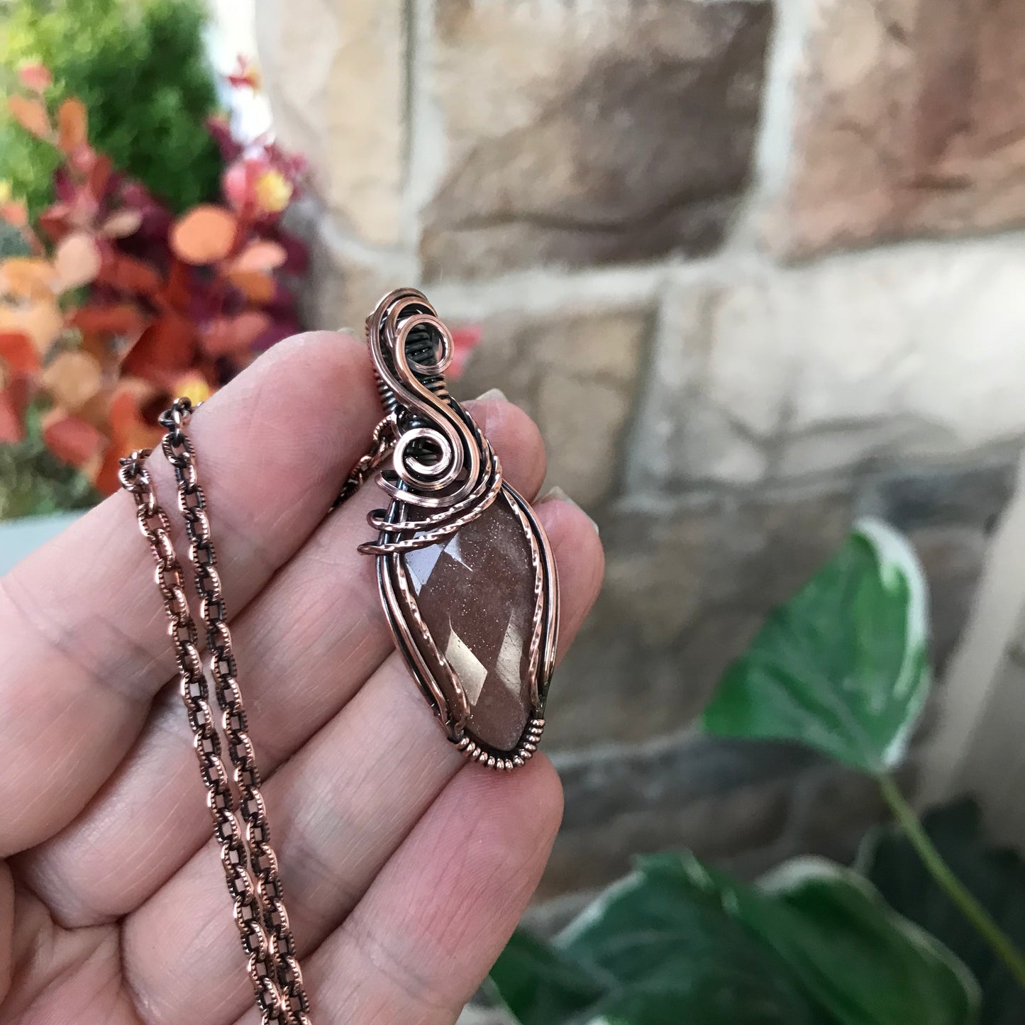 Faceted Peach Moonstone Swirly Copper Pendant