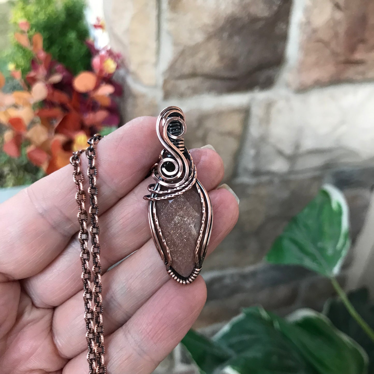 Faceted Peach Moonstone Swirly Copper Pendant