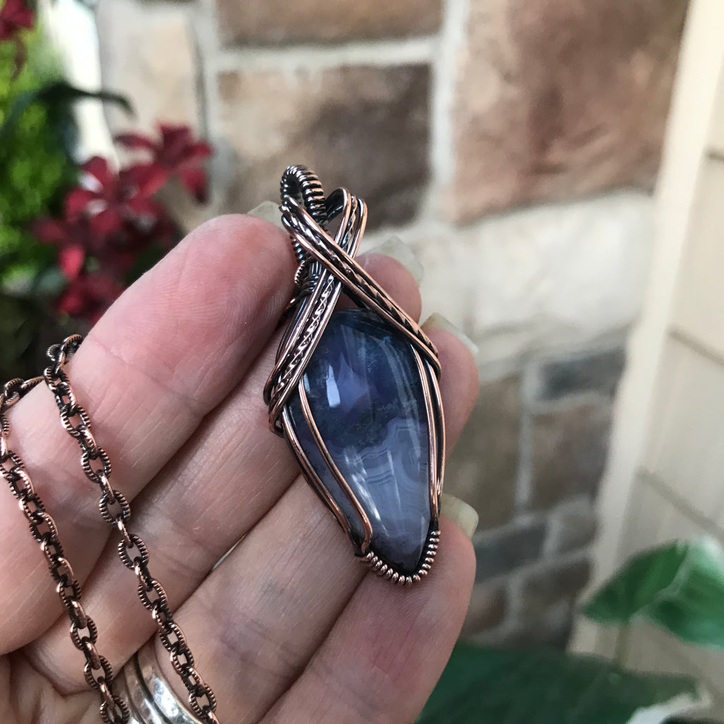 Purple moss agate chalcedony criss cross copper wire wrapped pendant by Moonlet Jewelry