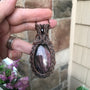 Purple mauve labradorite copper wire weave woven pendant with garnet by Moonlet Jewelry