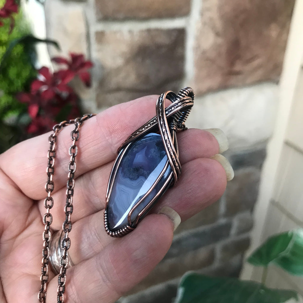Purple moss agate chalcedony criss cross copper wire wrapped pendant by Moonlet Jewelry