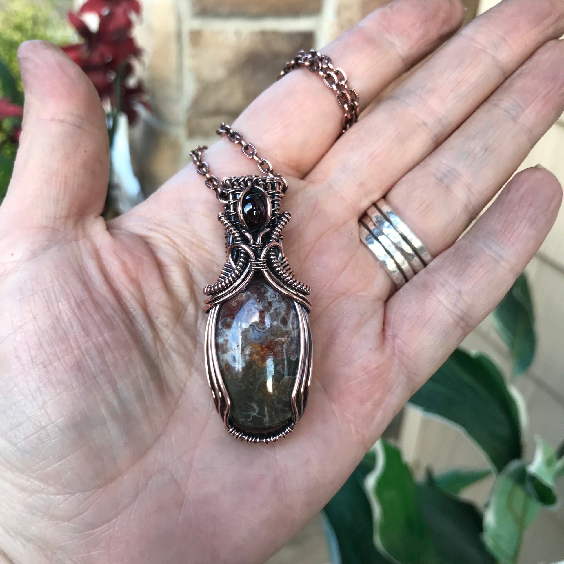 Oval Crazy Lace Agate & Garnet Woven Bail Copper Pendant