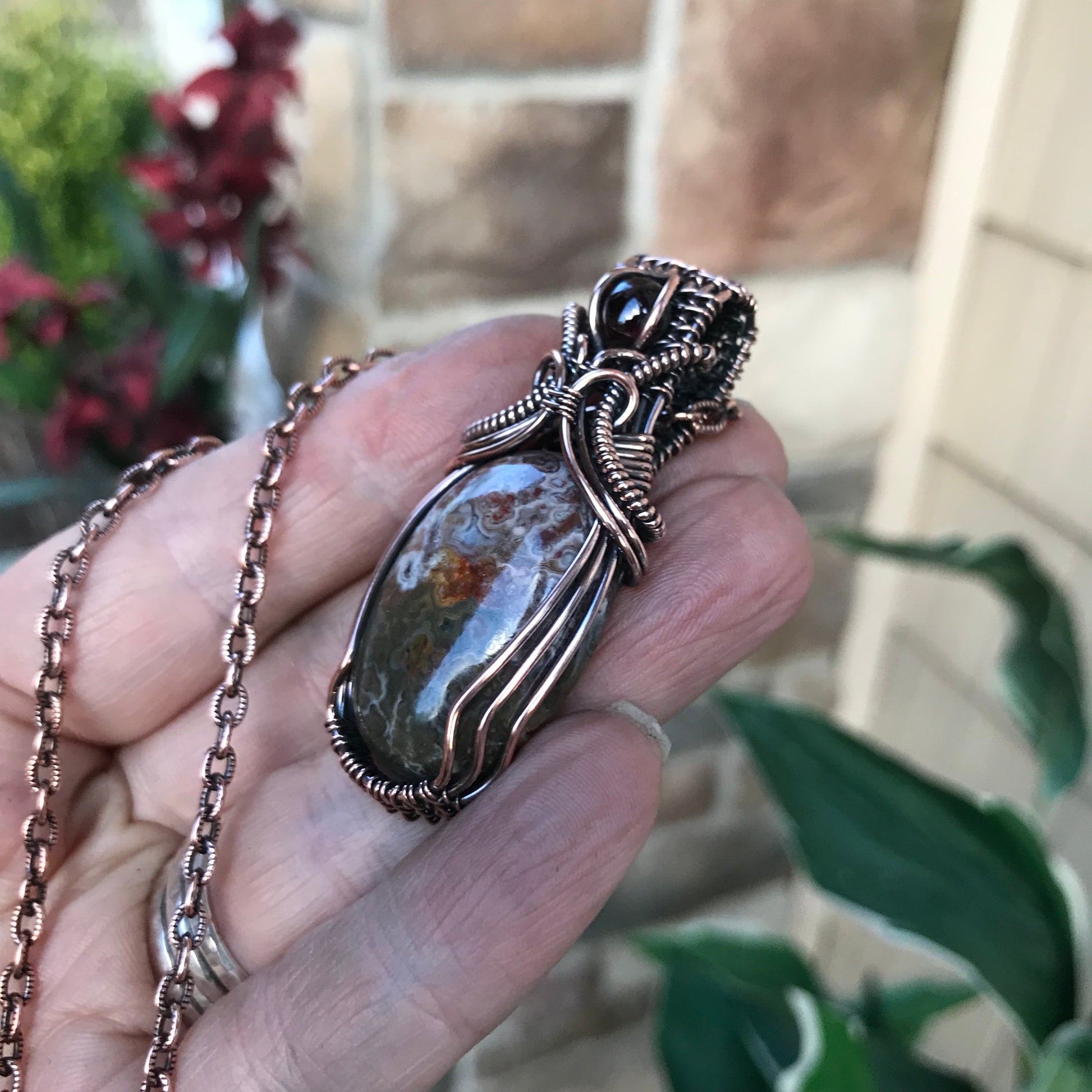 Oval Crazy Lace Agate & Garnet Woven Bail Copper Pendant