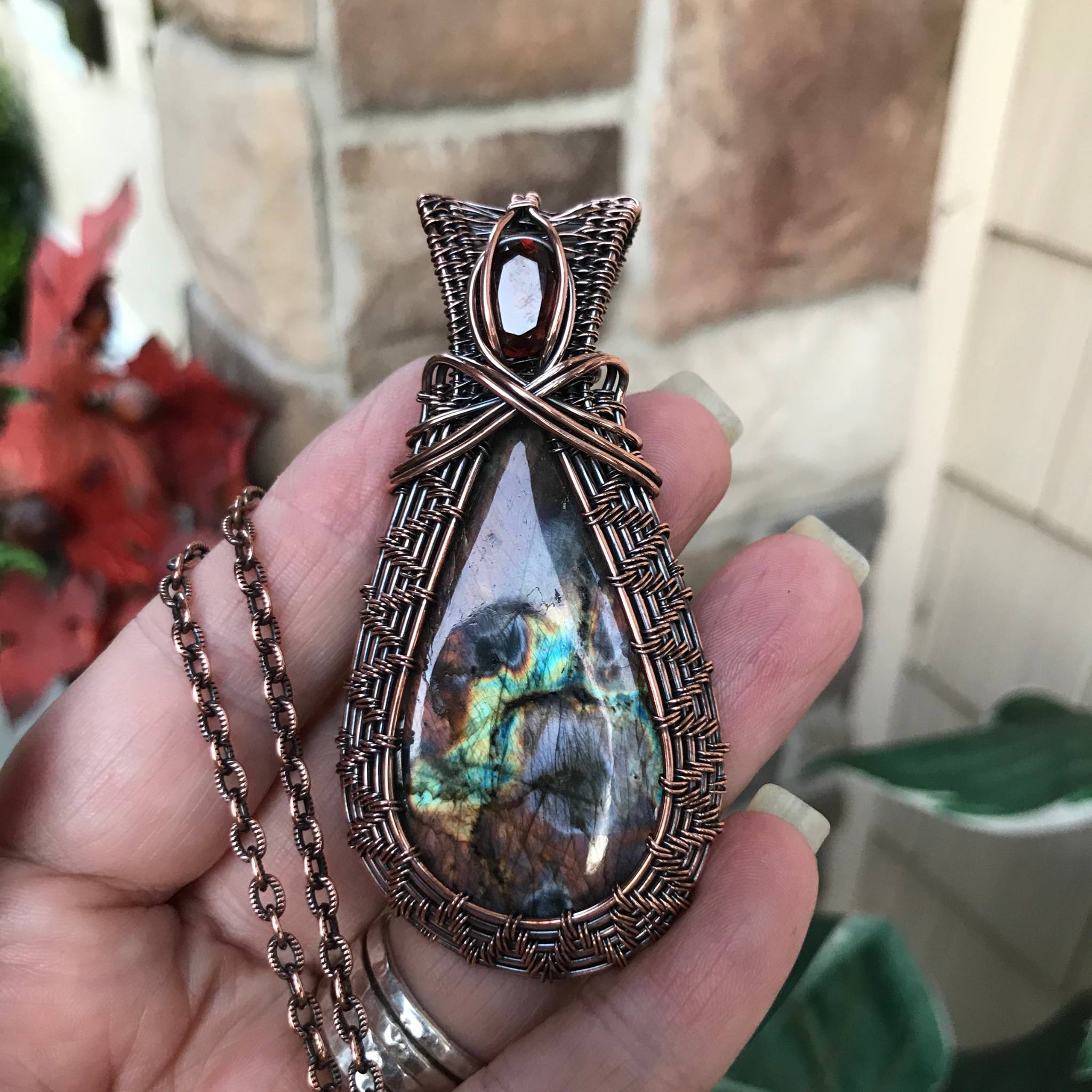 Amber purple labradorite woven copper pendant