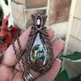 Amber purple labradorite woven copper pendant