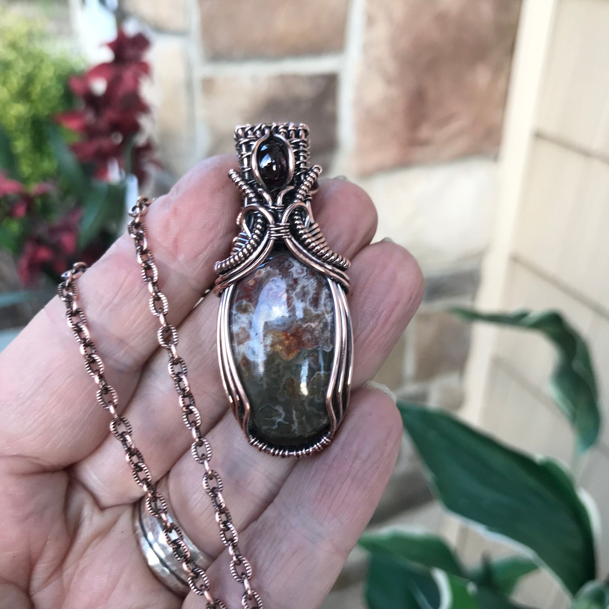 Oval Crazy Lace Agate & Garnet Woven Bail Copper Pendant