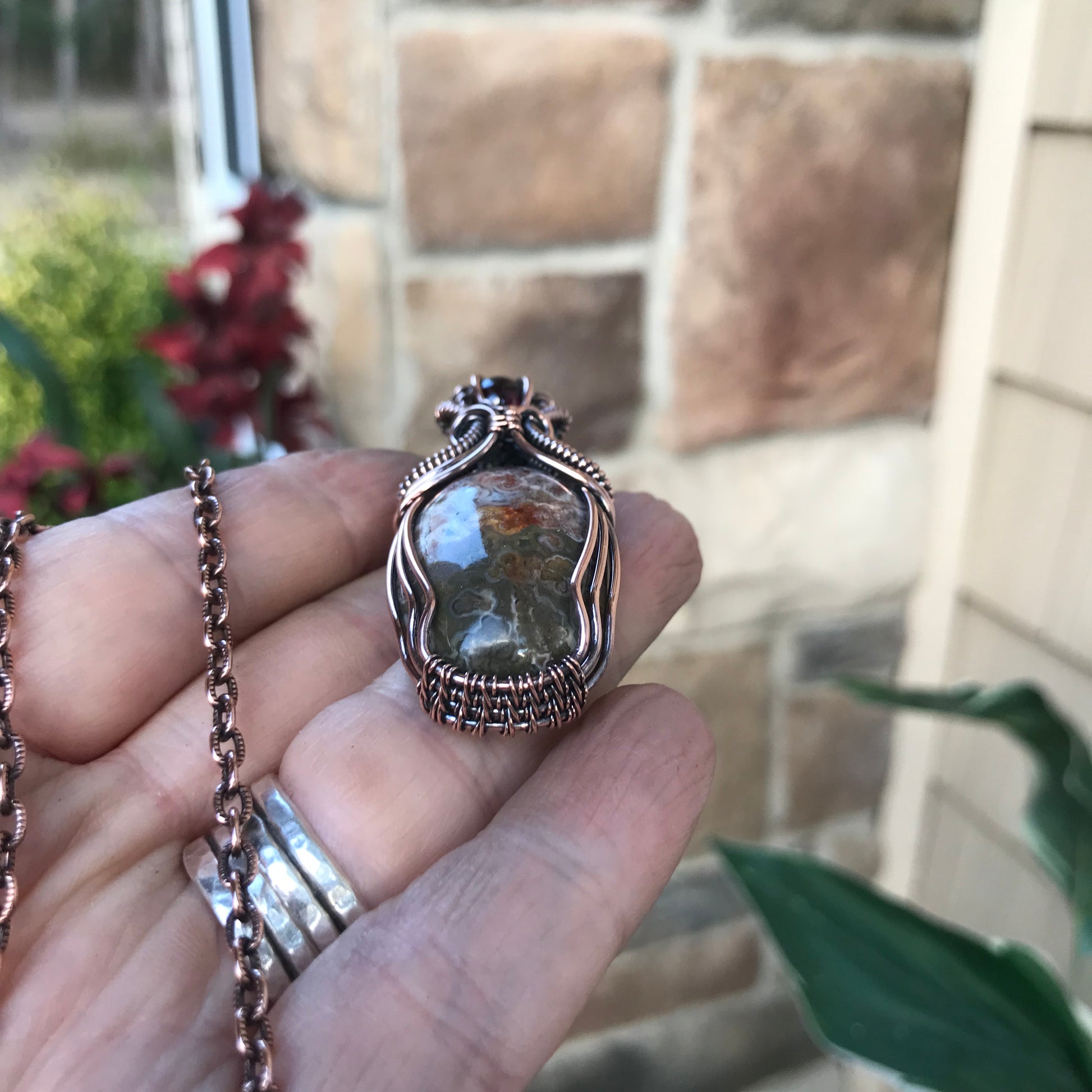 Oval Crazy Lace Agate & Garnet Woven Bail Copper Pendant