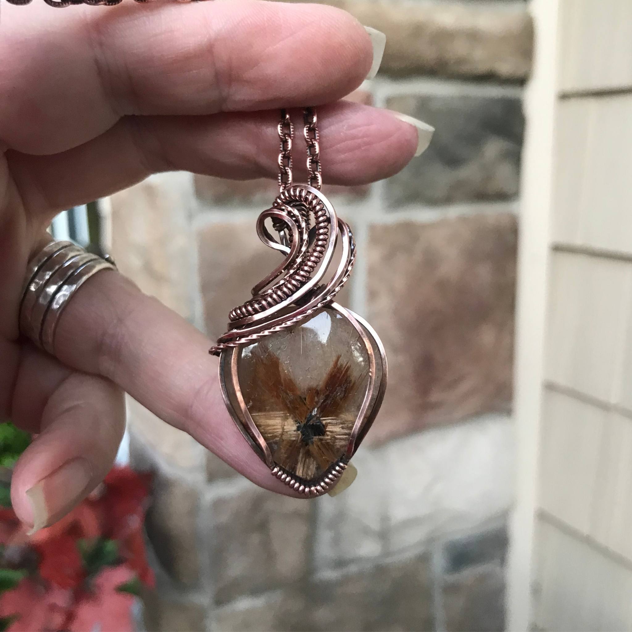 Golden star rutilated quartz copper wire wrapped pendant