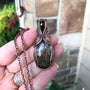 Mexican green crazy lace agate and garnet copper wire wrapped pendant