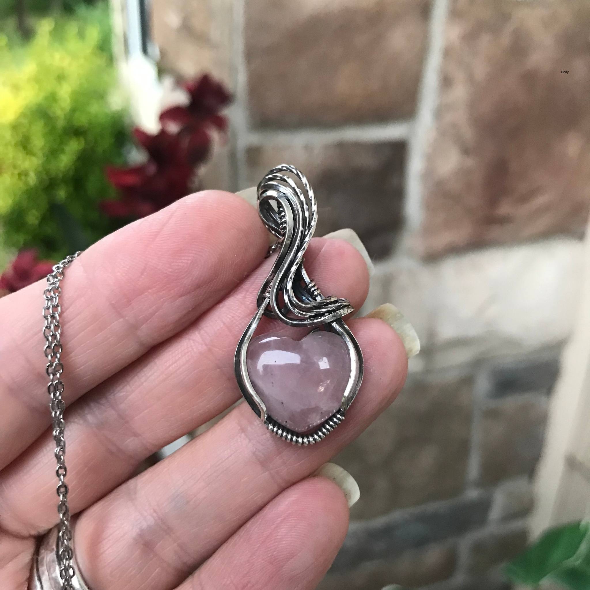 Rose quartz heart shaped sterling silver wire wrapped pendant by Moonlet Jewelry