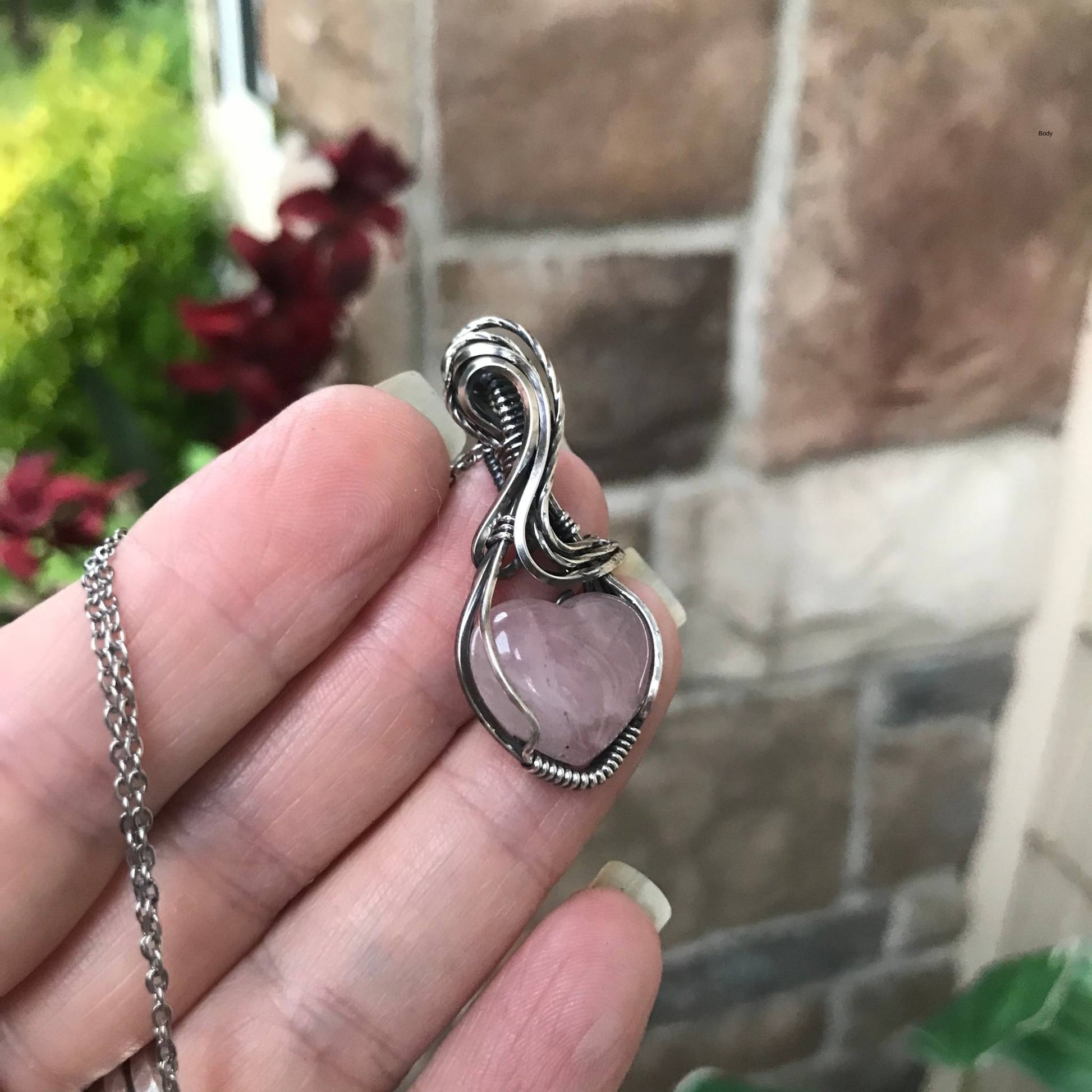 Rose quartz heart shaped sterling silver wire wrapped pendant by Moonlet Jewelry