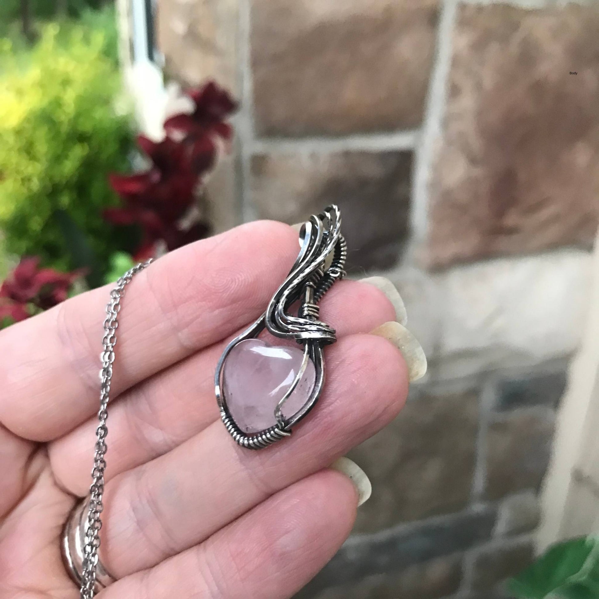 Rose quartz heart shaped sterling silver wire wrapped pendant by Moonlet Jewelry
