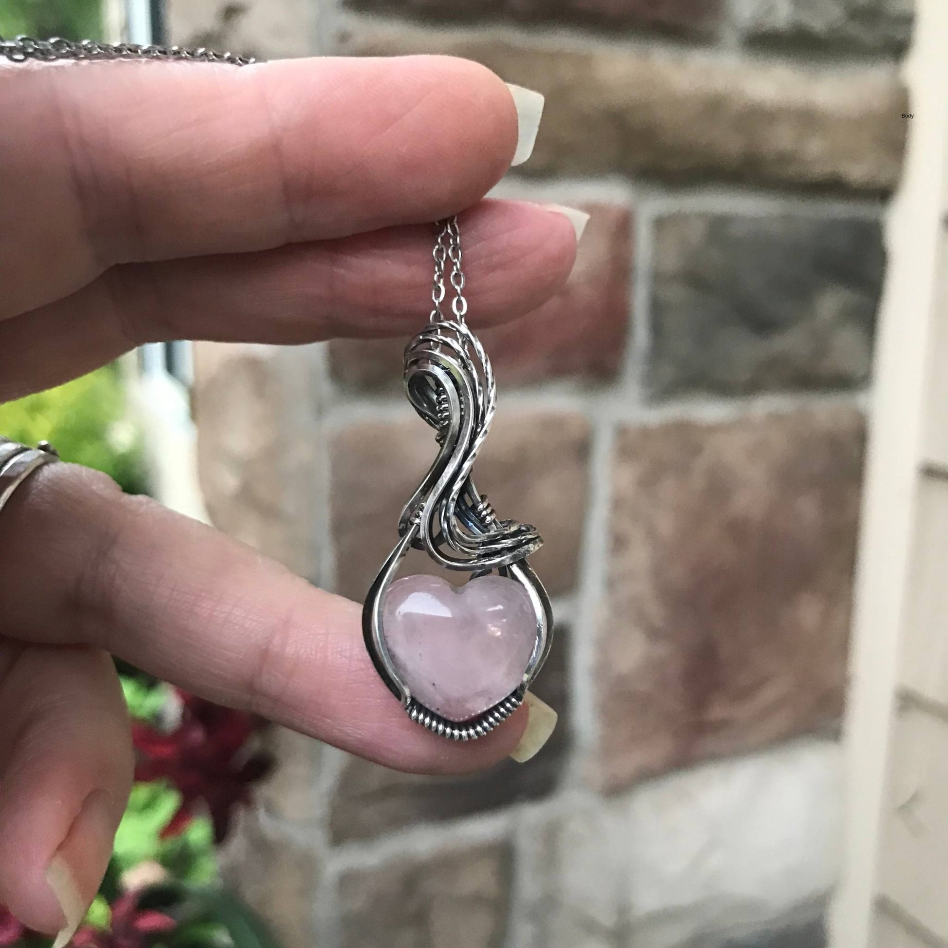 Rose quartz heart shaped sterling silver wire wrapped pendant by Moonlet Jewelry