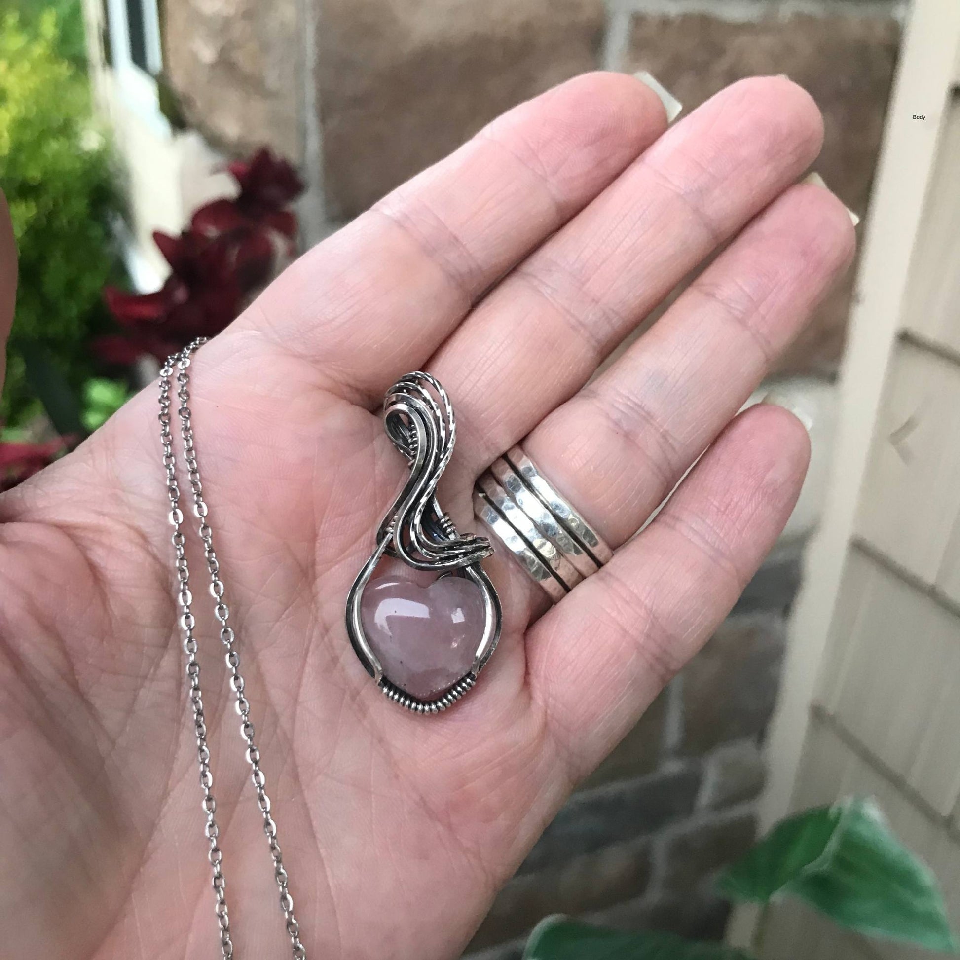 Rose quartz heart shaped sterling silver wire wrapped pendant by Moonlet Jewelry