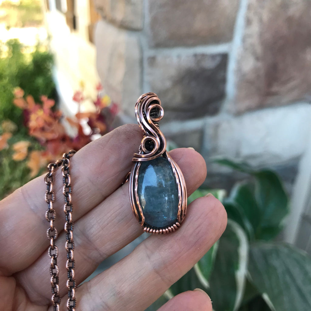 aquamarine small oval swirly copper pendant