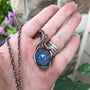 Aurora opal blue and green round copper wire wrapped pendant by Moonlet Jewelry