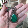 malachite copper wire woven pendant with garnet accent
