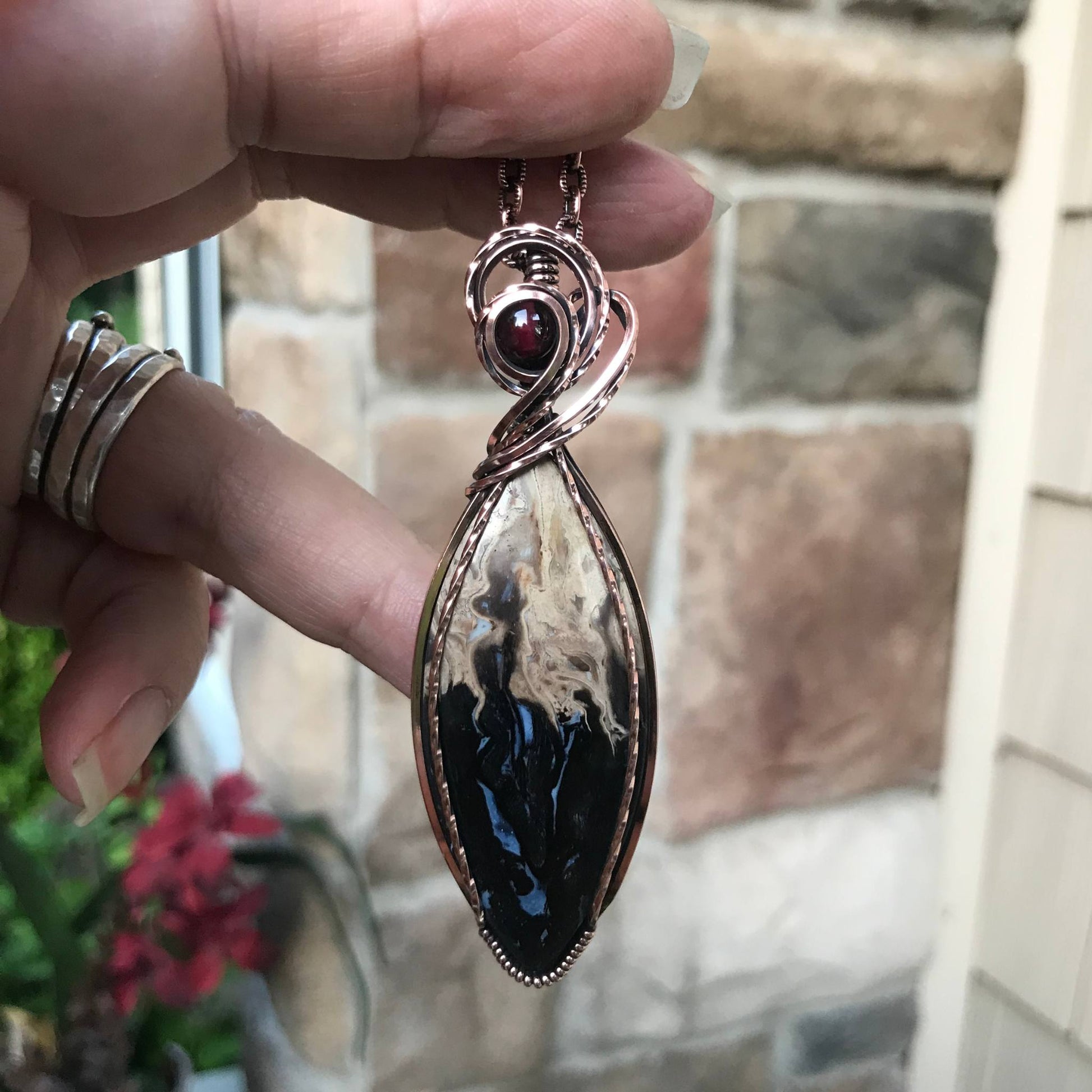 Petrified palm wood root marquis shaped copper wire wrapped pendant