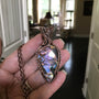 Purple faceted labradorite with woven bail copper pendant by Moonlet Jewelry