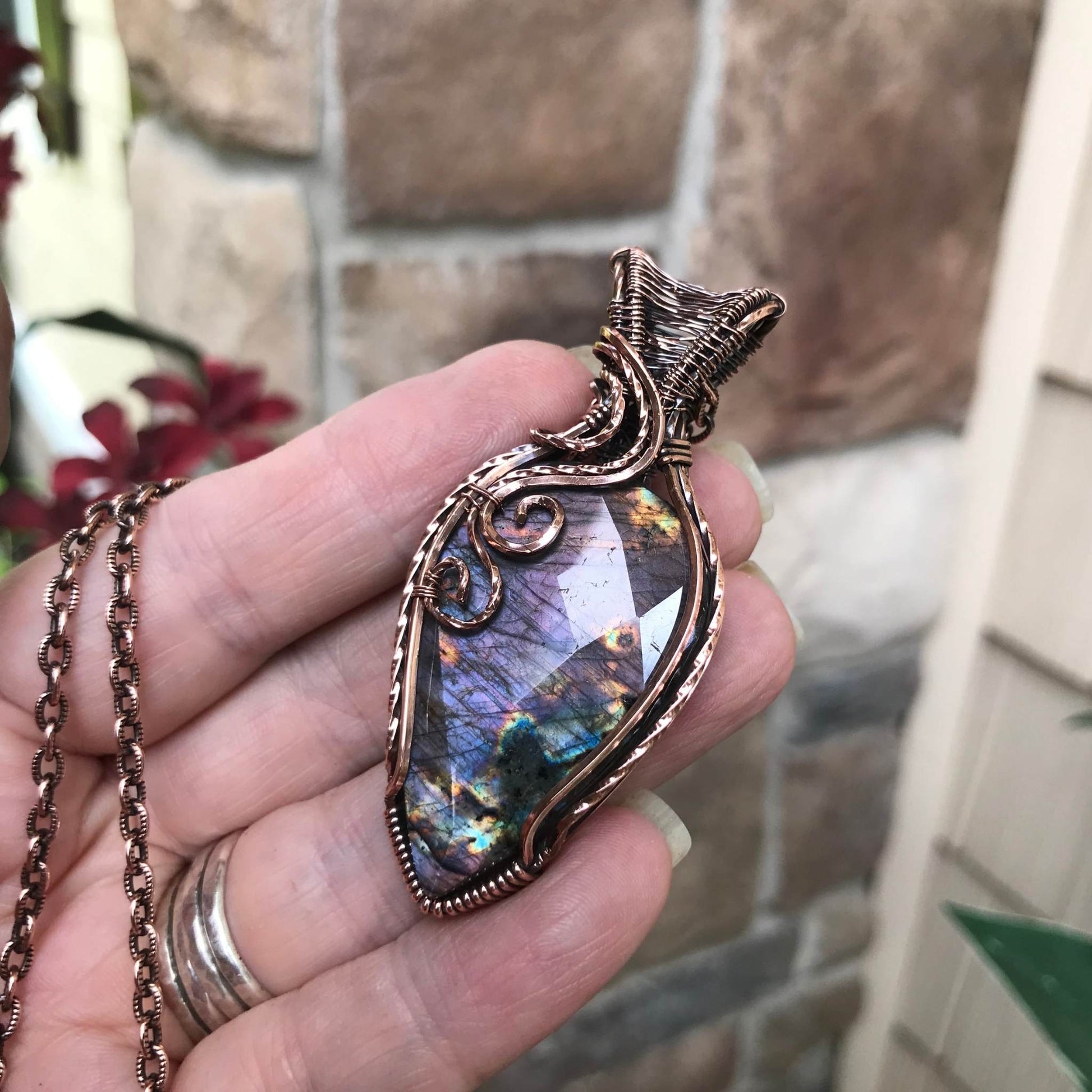 Purple faceted labradorite with woven bail copper pendant by Moonlet Jewelry