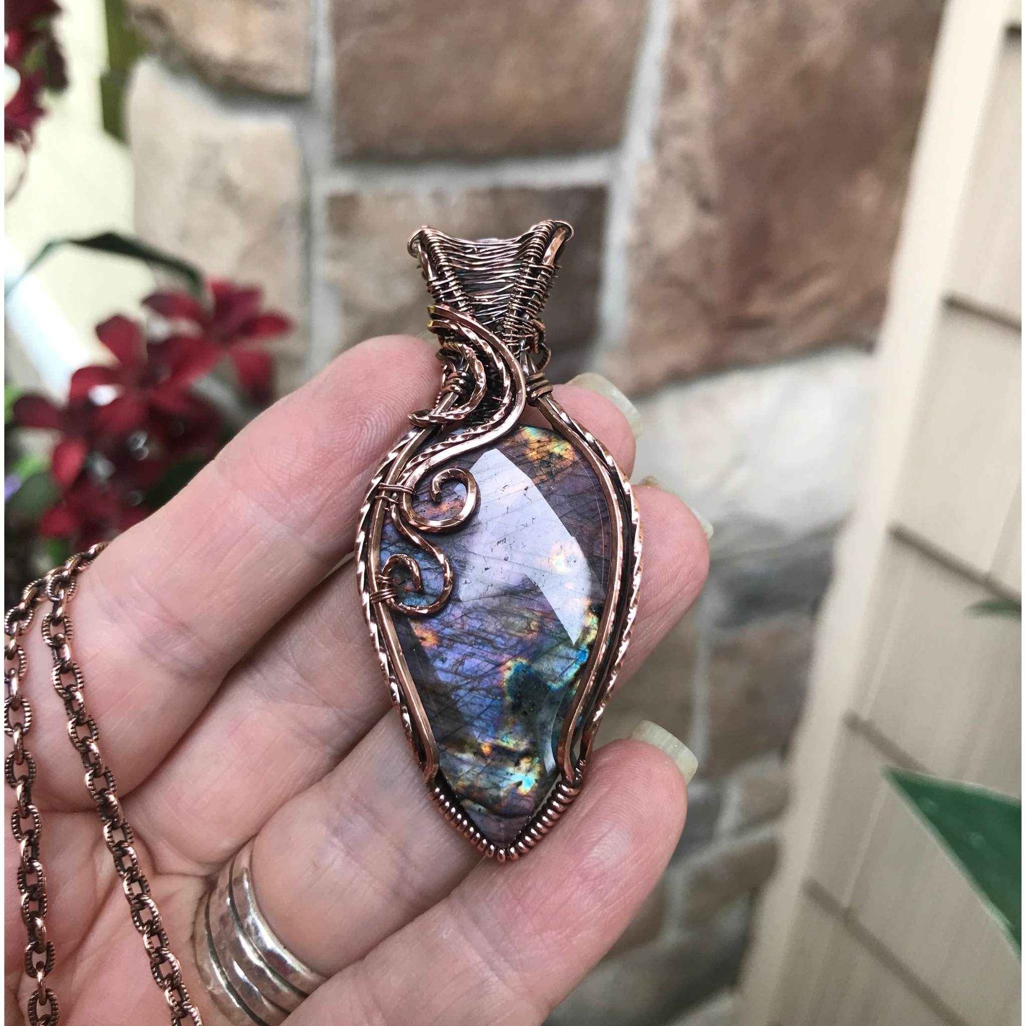 Purple faceted labradorite with woven bail copper pendant by Moonlet Jewelry