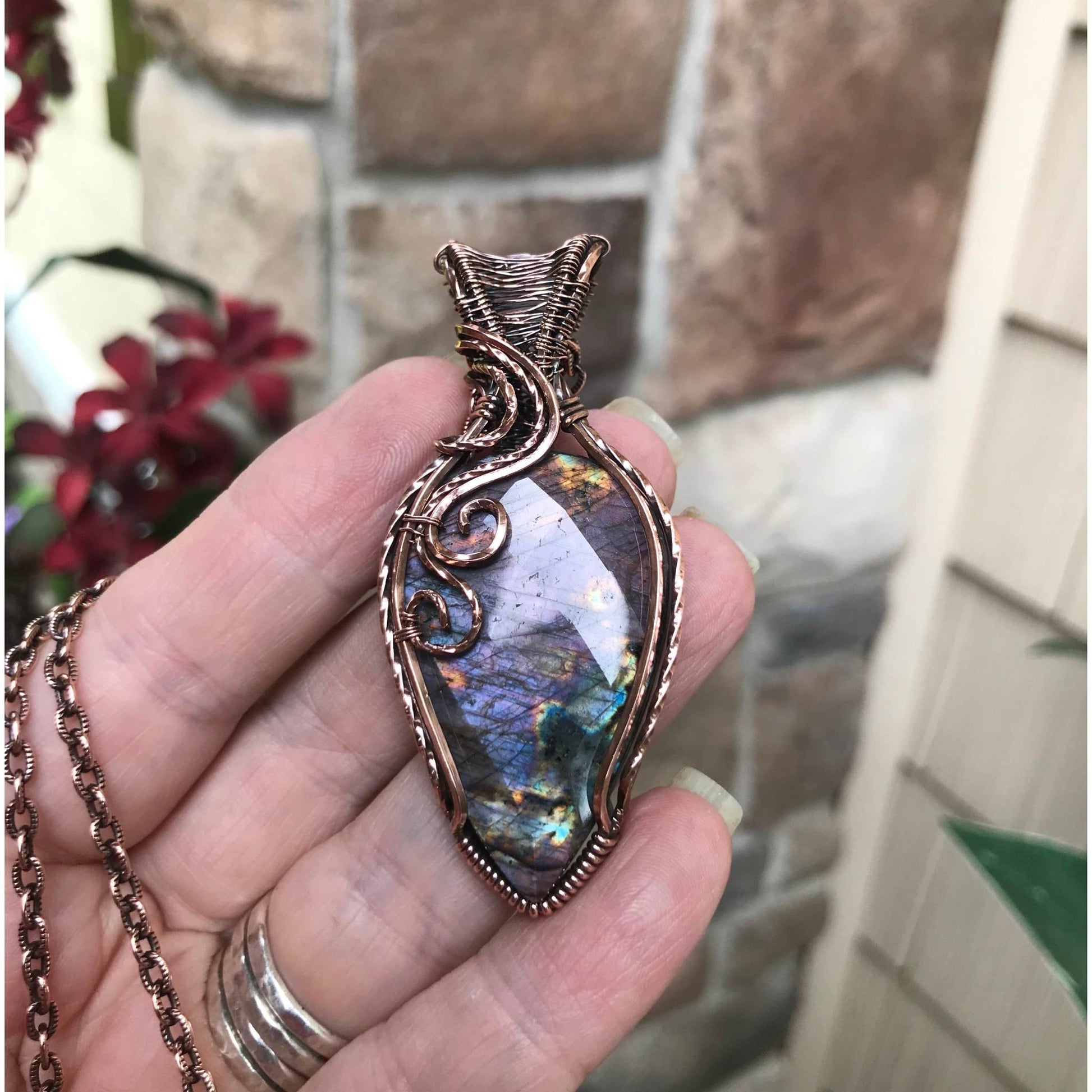 Purple faceted labradorite with woven bail copper pendant by Moonlet Jewelry