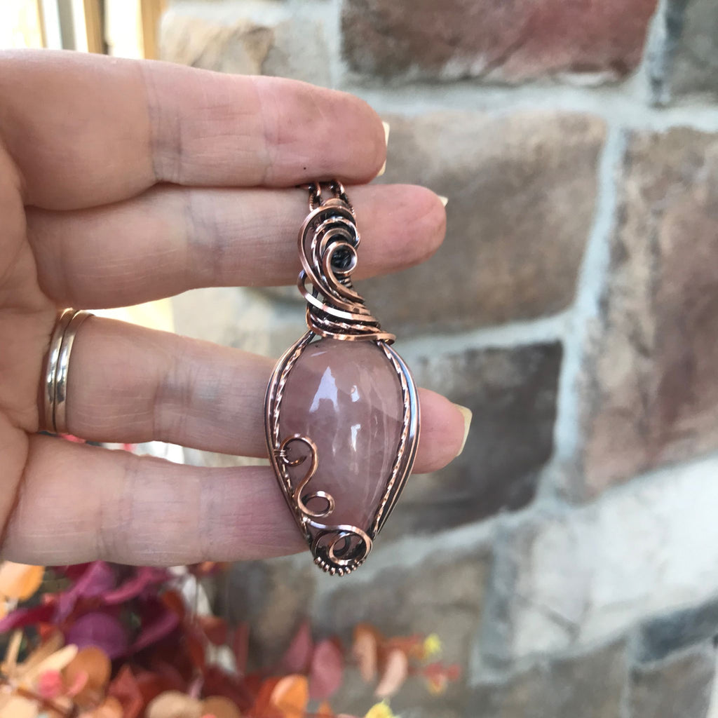 rose quartz swirly copper pendant 