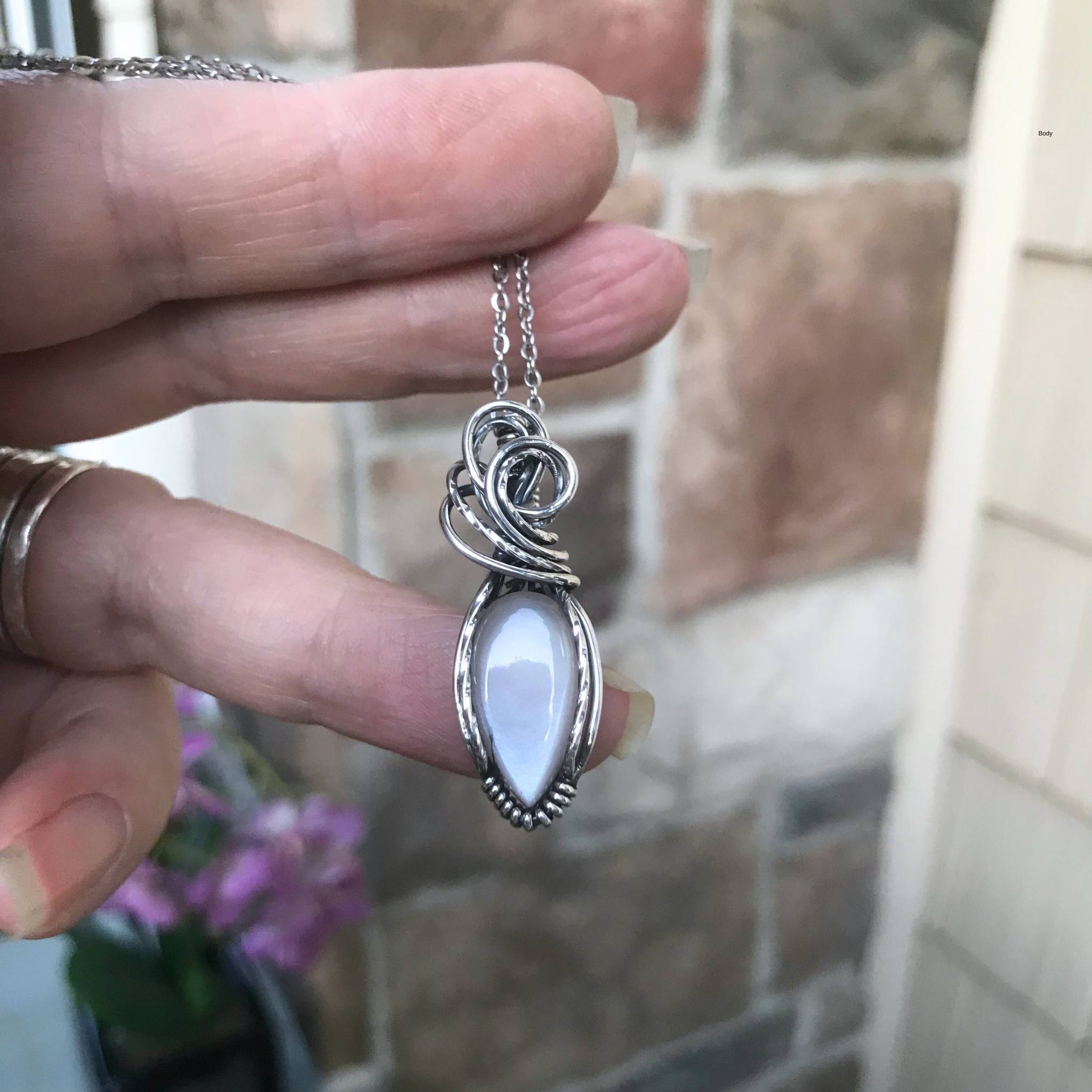 White moonstone silver wire wrapped pendant by Moonlet Jewelry