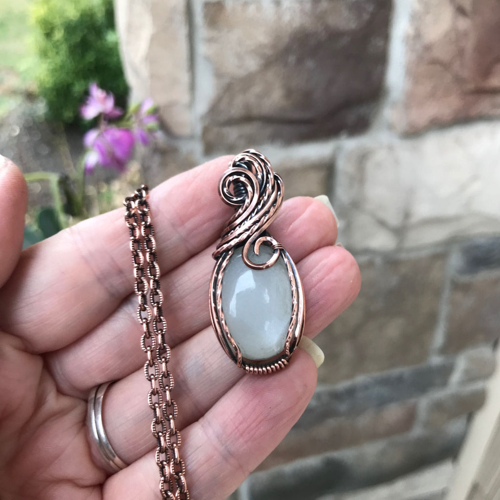white moonstone wire wrapped copper pendant