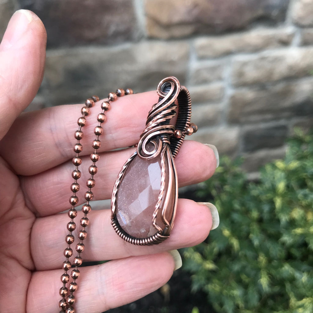 peach moonstone teardrop wire wrapped copper pendant necklace